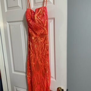 Jules and Cleo long orange prom dress.